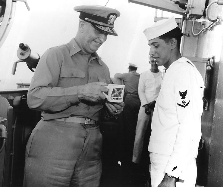 Admiral Burke and a Third Class Quartermaster on bridge of destroyer Picking, circa 1955-1961