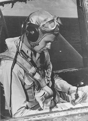 George Bush in the cockpit of his TBF Avenger torpedo bomber, mid-1944