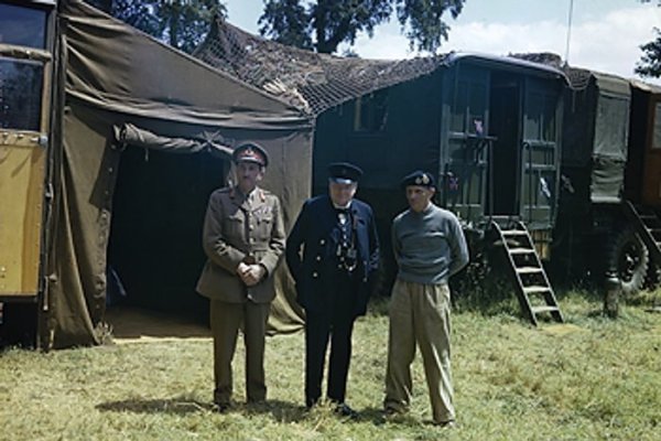 Alan Brooke, Winston Churchill, and Bernard Montgomery at Montgomery's mobile headquarters in Normandy, France, 12 Jun 1944. Photo 1 of 2.