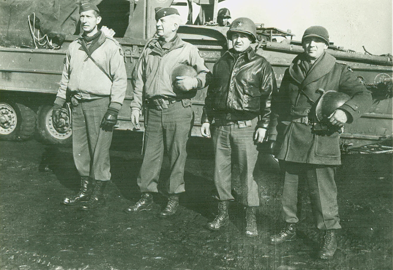 US Army Lieutenant General Mark Clark posing with his brigade commanders in front of a DUKW, 1944