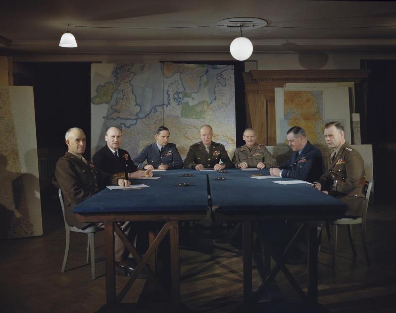 Bradley, Ramsay, Tedder, Eisenhower, Montgomery, Leigh-Mallory, and Smith at a SHAEF conference in London, England, United Kingdom, 1 Feb 1944, photo 5 of 7