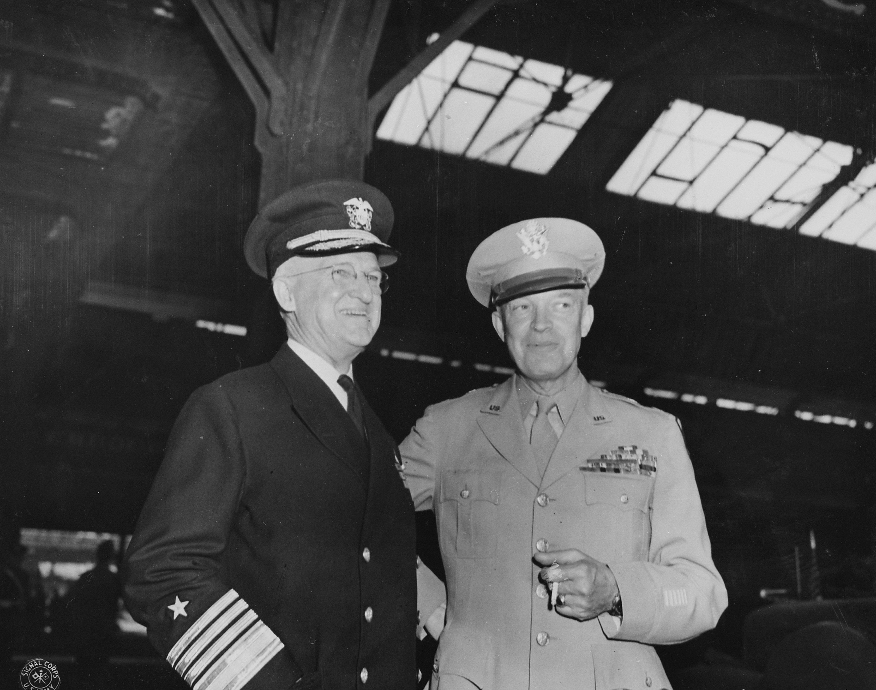 Admiral Harold Stark and General Dwight Eisenhower at Antwerp, Belgium, 15 Jul 1945, photo 1 of 2; they were awaiting the arrival of US President Harry Truman, en route for the Potsdam Conference