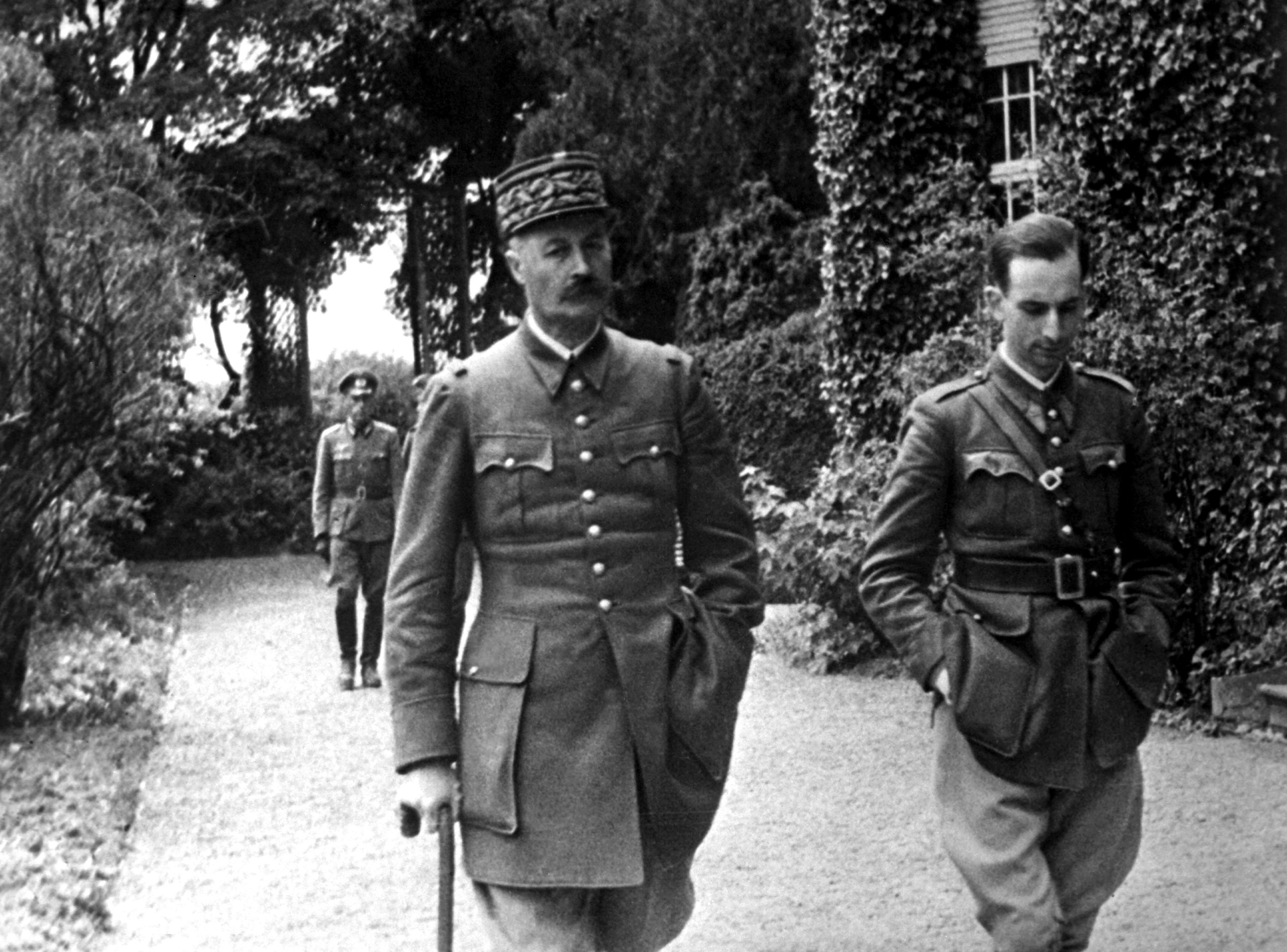 Captured French Army General Giraud taking a walk in the garden of the house in which he was imprisoned, Germany, circa 1940-1941