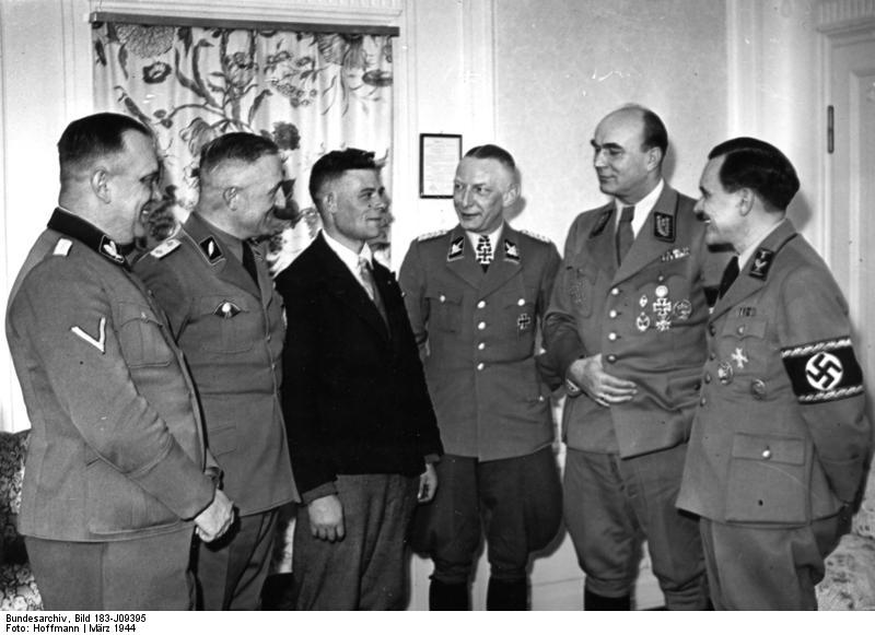 Greiser speaking to he one millionth German resettler of Wartheland, Posen, Germany, 16 Mar 1944