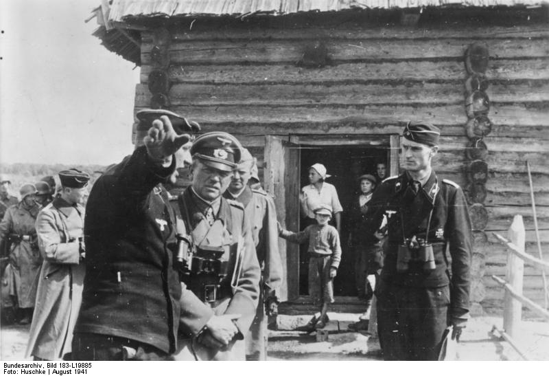 German Army Colonel General Heinz Guderian visiting a forward headquarters of an armor regiment, Russia, Aug 1941