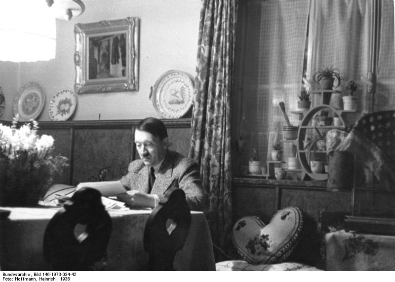 Reich Chancellor Adolf Hitler reading paperwork at a house in Obersalzberg, Bavaria, Germany, 1936