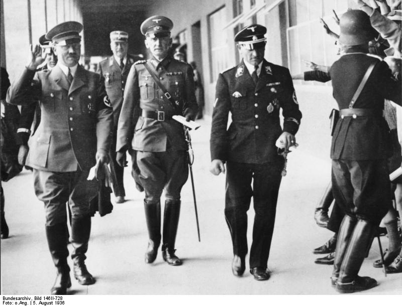 Chancellor Hitler, General Witzleben of German III Corps, and SS-Obergruppenführer Dietrich leaving the 300m freestyle swimming event of the 1936 Summer Olympic Games, Berlin, Germany, 5 Aug 1936