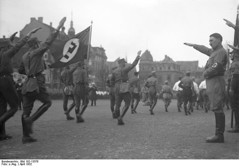 Adolf Hitler reviewing a Nazi SA parade, Braunschweig, Germany, Apr 1932