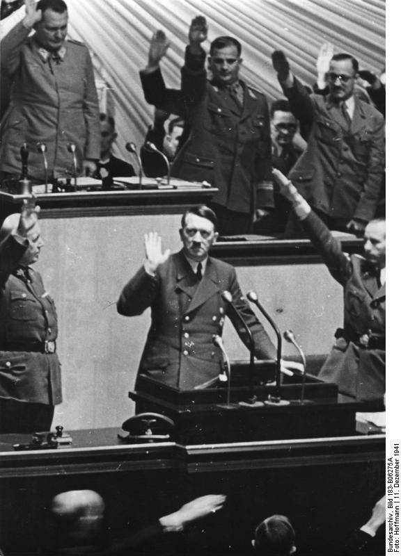 German Reichstag saluting Adolf Hitler shortly after Germany's declaration of war on the United States, Kroll Opera House, Berlin, Germany, 11 Dec 1941; note Göring and Lammers