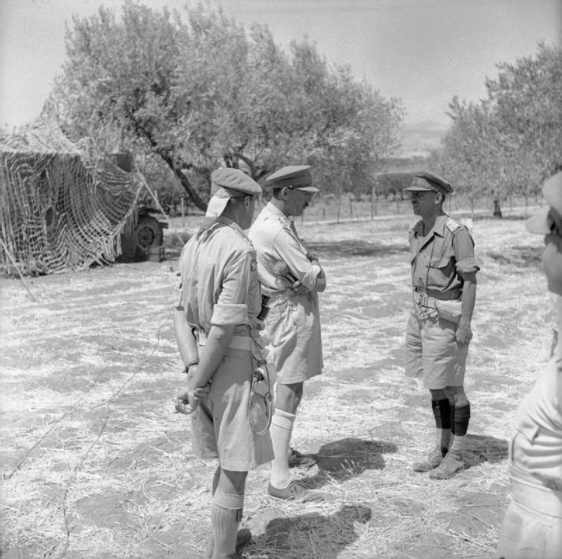 Brigadier R. E. Urquhart, Lieutenant General Oliver Leese, and Lieutenant Colonel W. B. H. Ray in Sicily, Italy, 1943