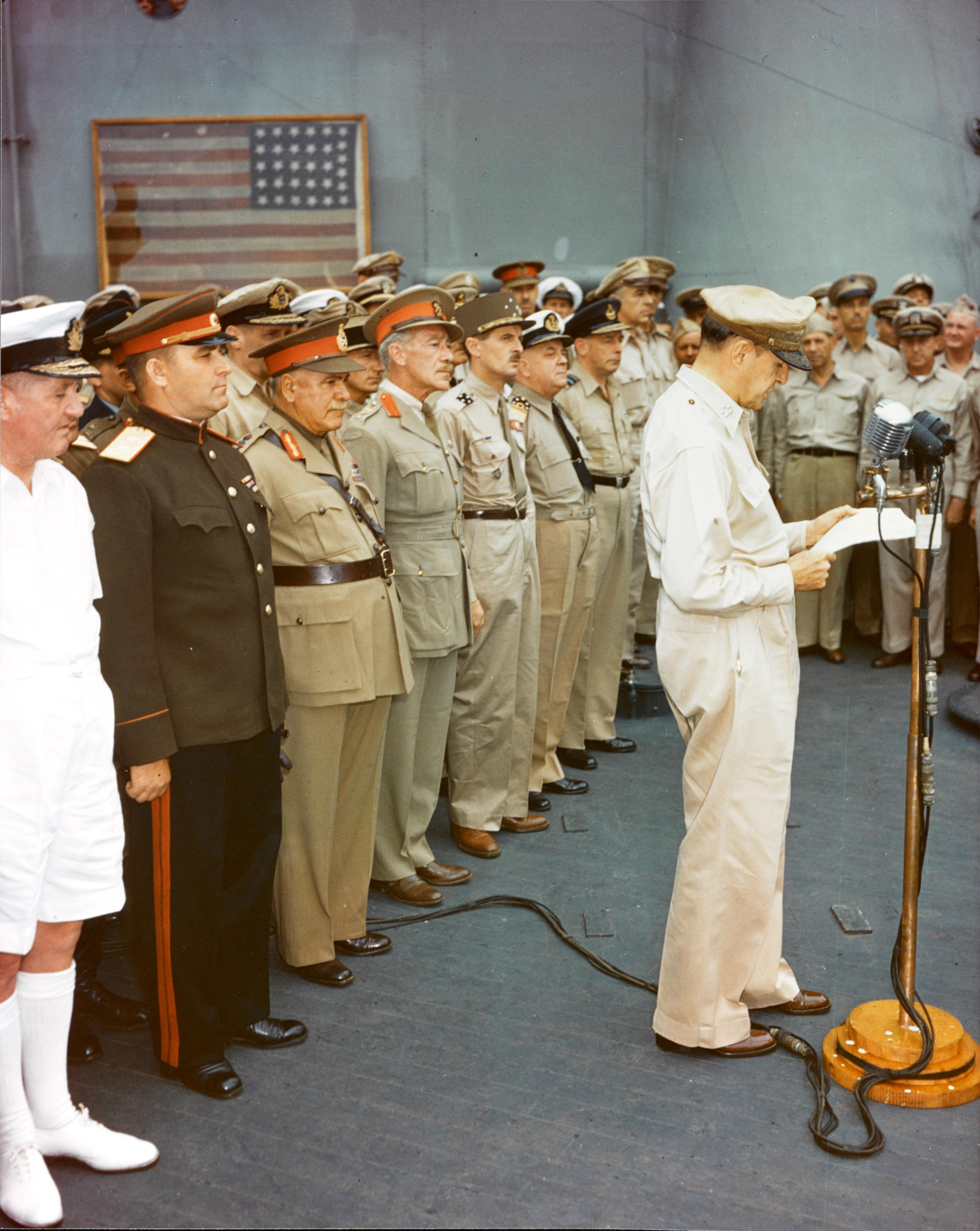 General Douglas MacArthur speaking aboard USS Missouri, Tokyo Bay, Japan, 2 Sep 1945, 2 of 4