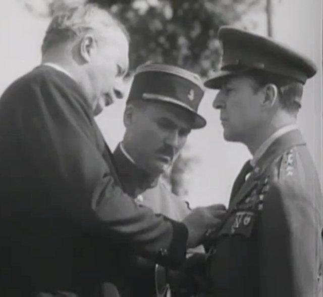 Douglas MacArthur receiving a French decoration, 1930s