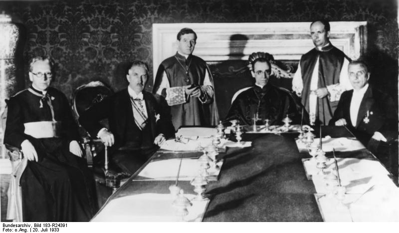 Cardinal Secretary of State Eugenio Pacelli (later Pope Pius XII) of Vatican City with Vice Chancellor Franz von Papen of Germany during the signing the Reichskonkordat in Rome, Italy, 20 Jul 1933