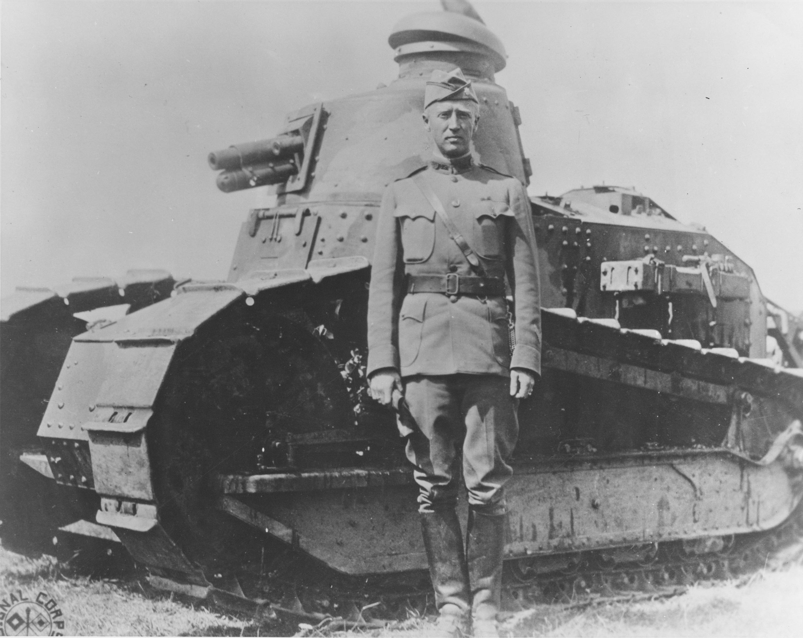 Lieutenant Colonel George Patton of US 1st Tank Battalion standing before a Renault light tank in France, summer 1918