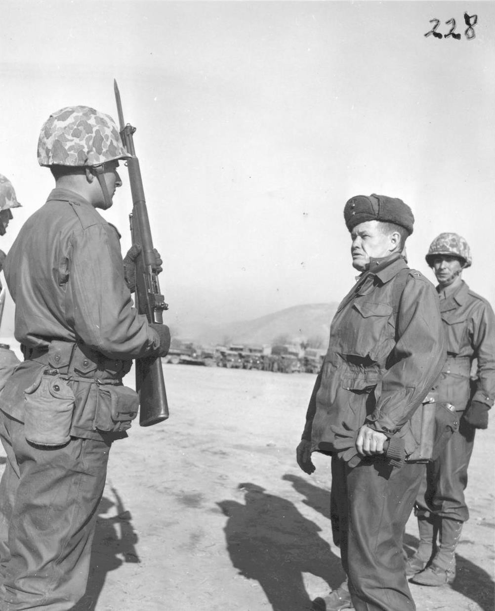Lewis Puller inspecting a groop of Marines, 26 Jan 1951
