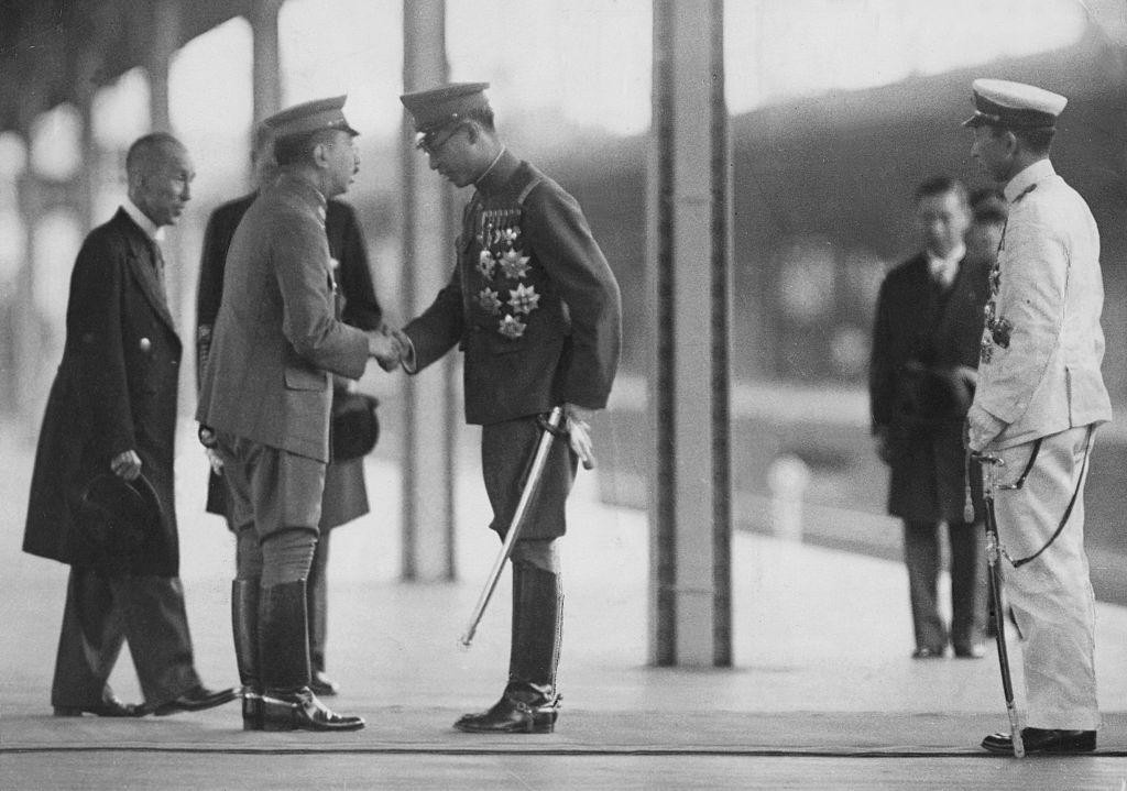 Emperor Showa of Japan greeting Emperor Kangde of puppet state of Manchukuo, Tokyo Station, Tokyo, Japan, 1935
