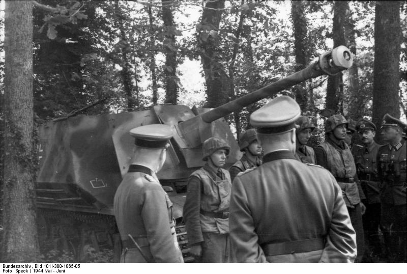 Rommel inspecting the German 21st Panzer Division, Normandy, France, 30 May 1944, photo 1 of 4; note Marder I tank destroyer converted from a French Hotchkiss H35 tank