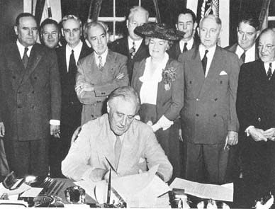 US President Roosevelt signing the Servicemen's Readjustment Act (unofficially 'G. I. Bill of Rights'), 22 Jun 1944