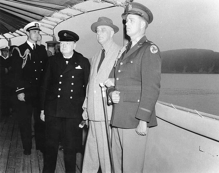 Winston Churchill, Franklin Roosevelt, and Roosevelt's sons Franklin and Eliott aboard USS Augusta off Newfoundland, Aug 1941, photo 1 of 2