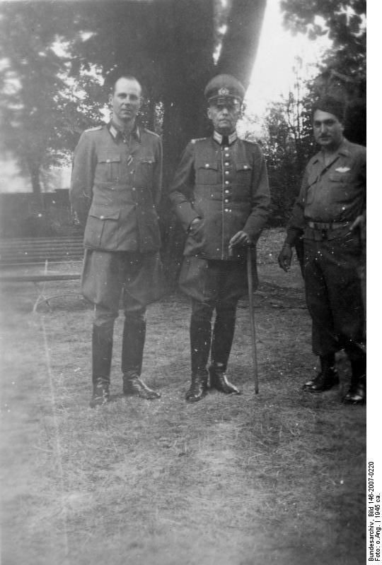 German Field Marshal Gerd von Rundstedt and his son as prisoners of war, circa 1945; the guard at right of photo was US Army Staff Sergeant Bisecha