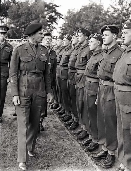Lieutenant General Guy Simonds inspecting II Canadian Corps in Meppen, Germany, 31 May 1945