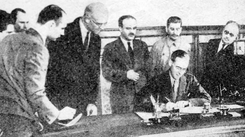 British Ambassador Stafford Cripps signing a mutual assistance agreement between the United Kingdom and the Soviet Union, Moscow, Russia, 12 Jul 1941