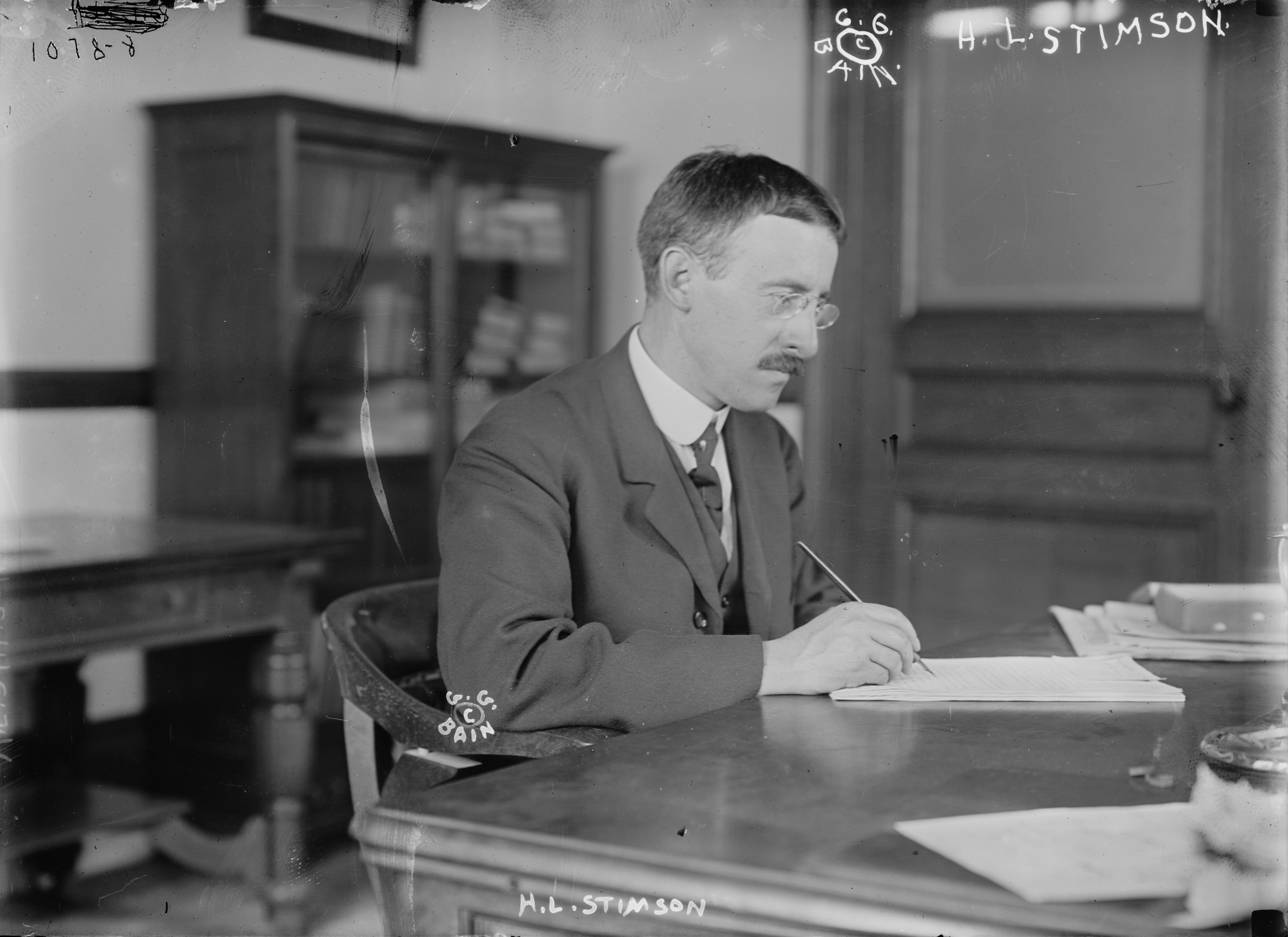 Henry Stimson at a desk, 1910