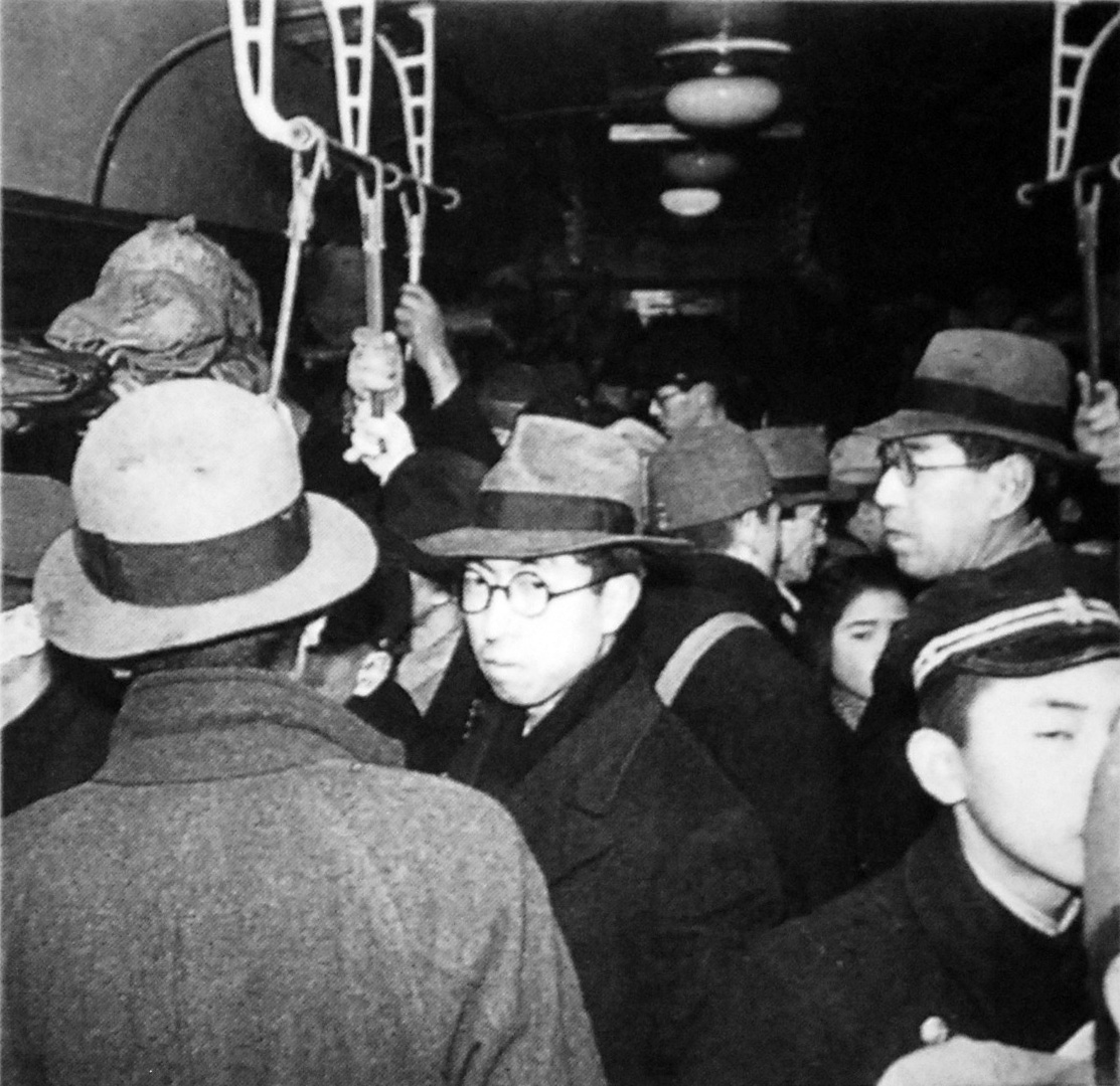 Prince Takahito aboard a train on the Yokosuka Line, Japan, 1946