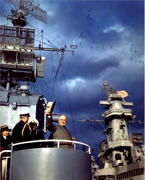 Truman aboard USS Renshaw during Navy Day Fleet Review, New York City, New York, United States, 27 Oct 1945; note USS Missouri's superstructure in background and US Navy aircraft in formation above
