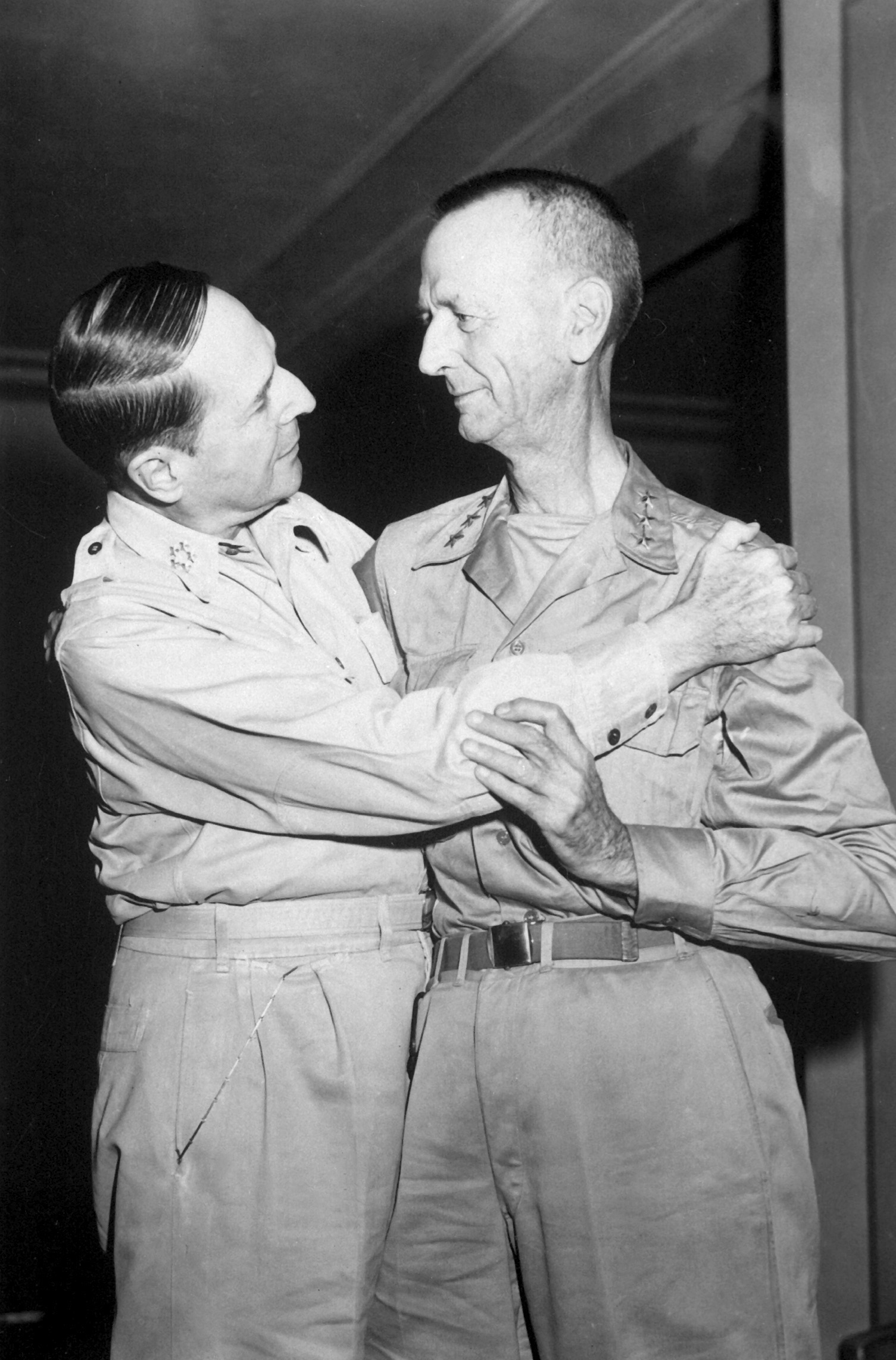 MacArthur embracing Wainwright, the New Grand Hotel, Yokohama, Japan, 31 Aug 1945