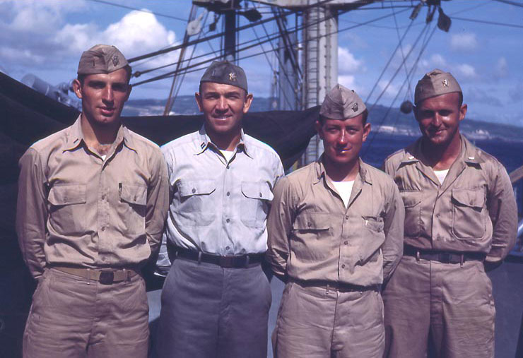 Lieutenant Howard W. Whalen (in grey uniform) with other officers of USS Sanborn, 1945