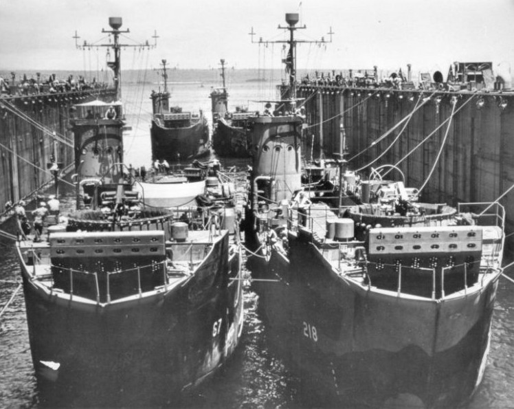 USS ABSD-1 with USS LSM-67, USS LSM-218, USS LSM-269, and USS LSM-219 in the dock, Espiritu Santo, New Hebrides, 17 Nov 1944, photo 1 of 2