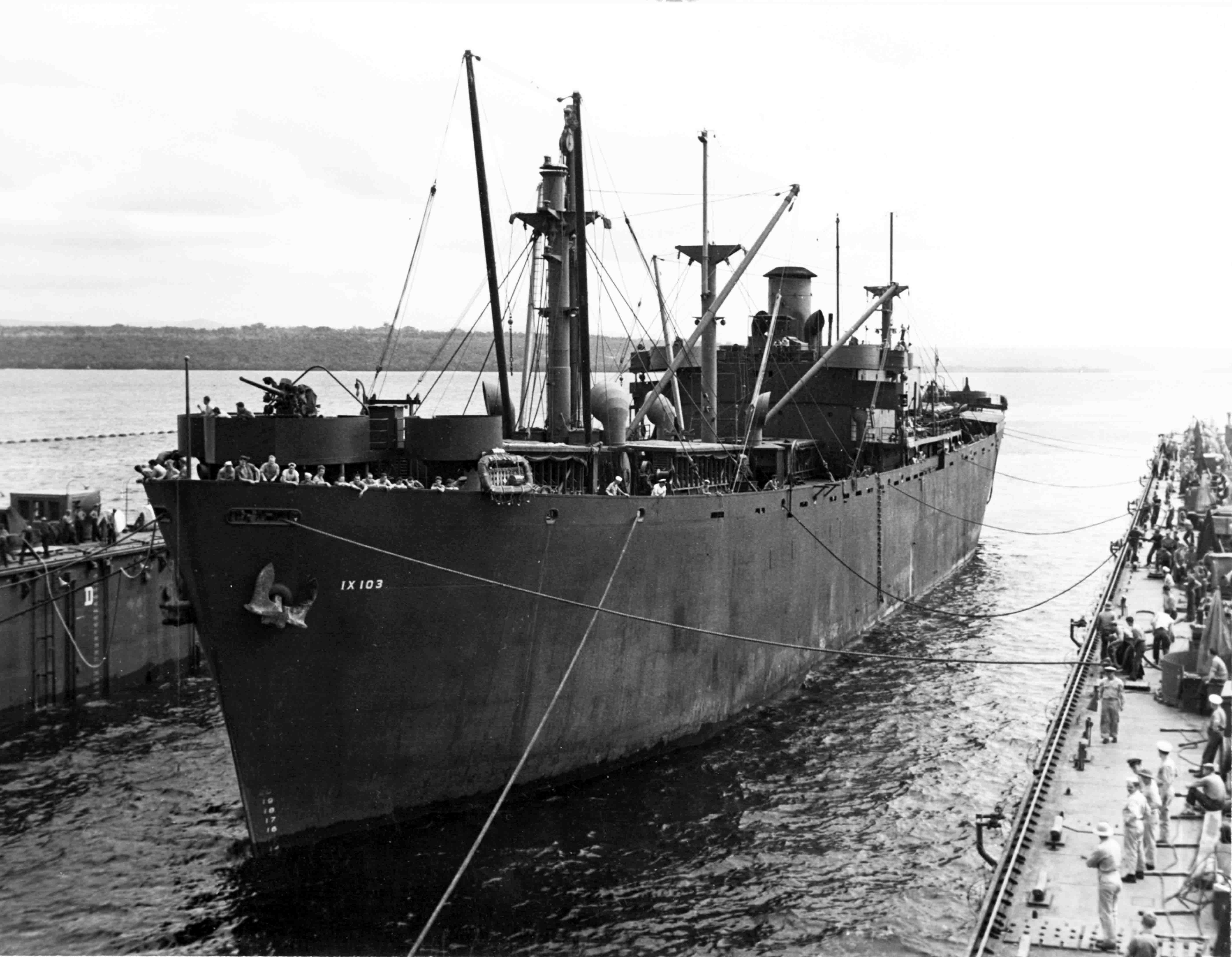 USS E. A. Poe entering USS ABSD-1 at Espiritu Santo, New Hebrides Islands, 3 Jun 1944
