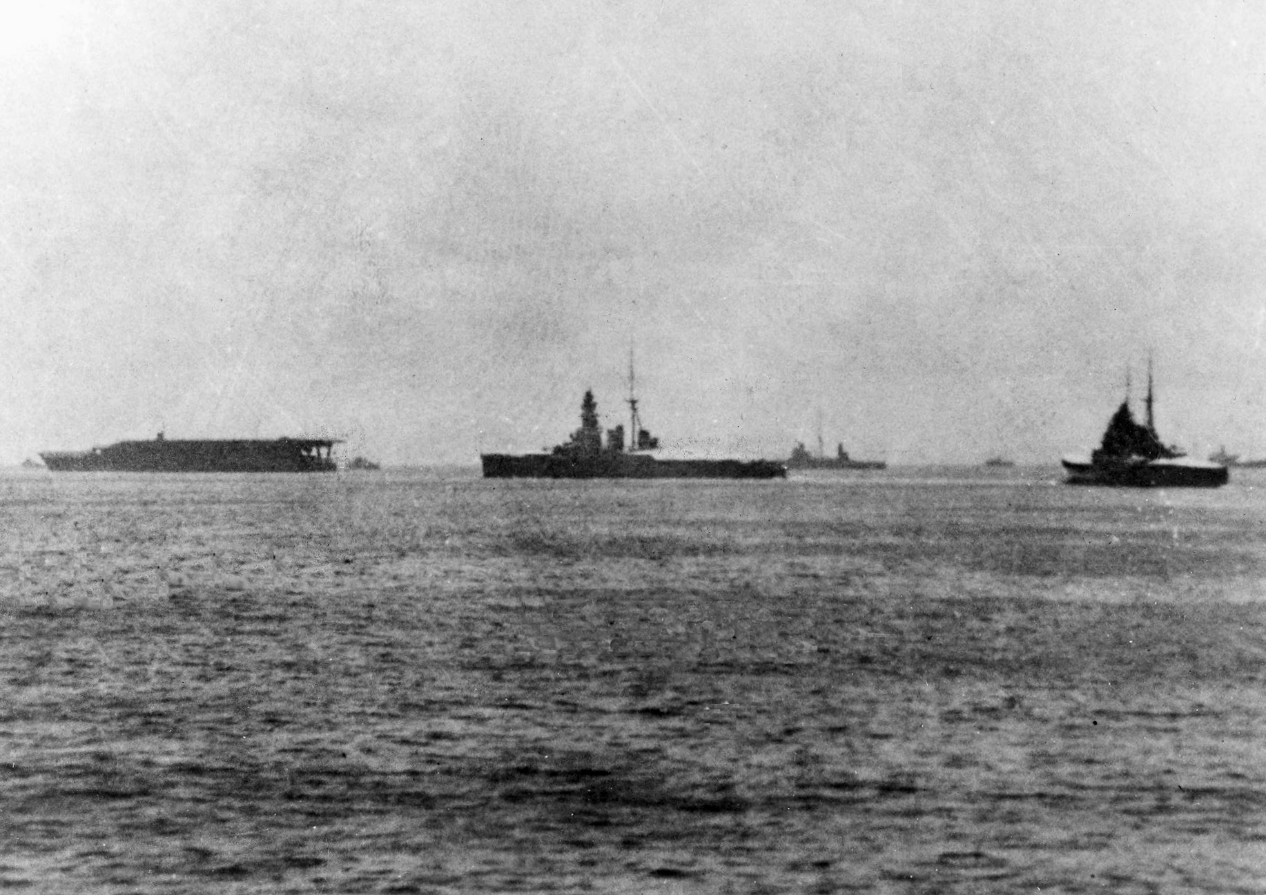 Kaga, Hiei, Kasuga, and a Takao-class cruiser in harbor, 1932-1934