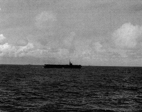 USS Coral Sea a short distance off Kwajalein Atoll, Marshall Islands, 1 Feb 1944; photo taken from USS Manila Bay