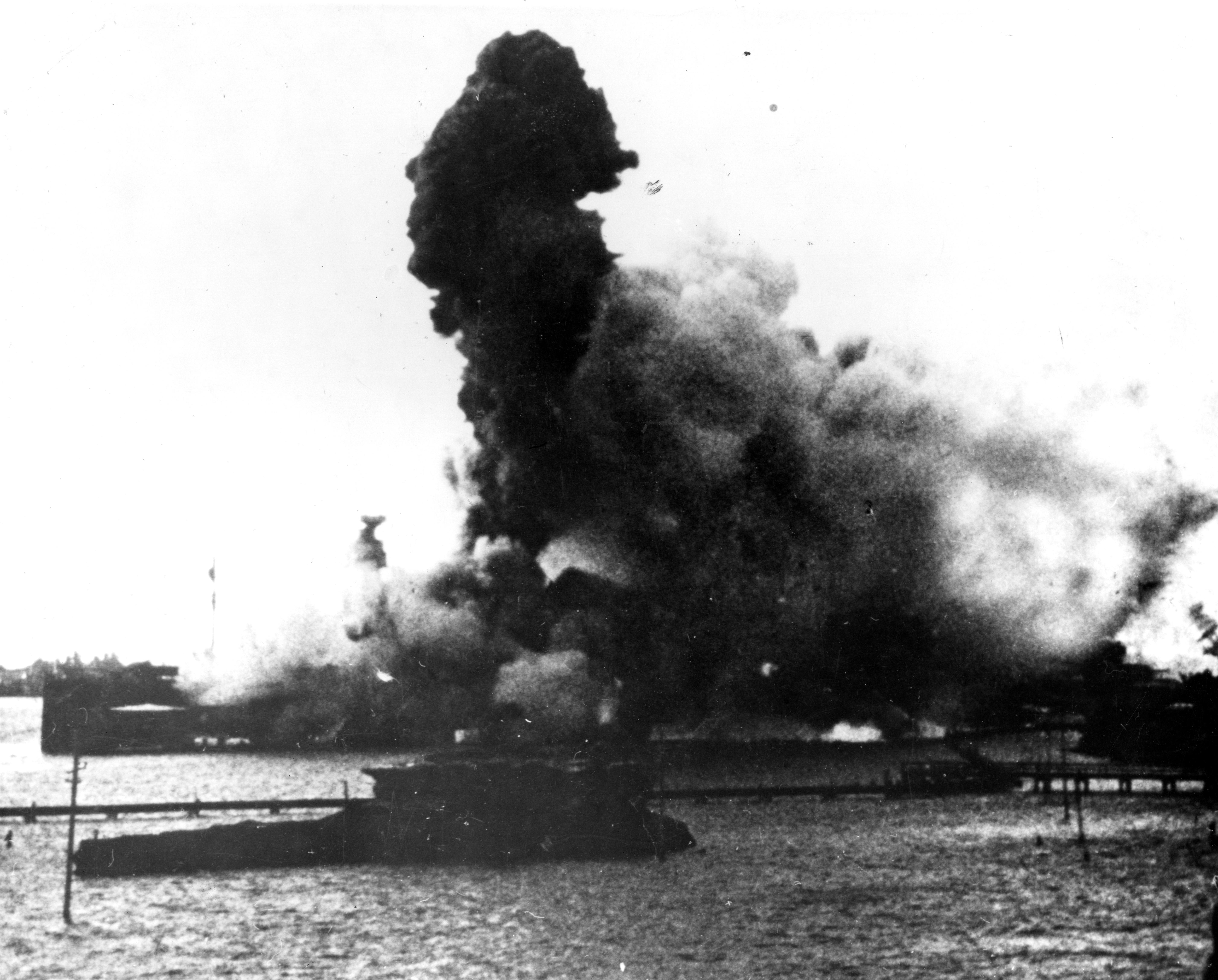 USS Arizona's forward magazines exploding during the Pearl Harbor attack, US Territory of Hawaii, shortly after 0800 hours, 7 Dec 1941, photo 2 of 2