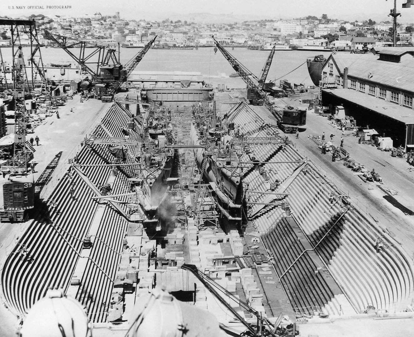 USS Boarfish and USS Blueback in the drydock at Mare Island Navy Yard, Vallejo, California, United States, 12 Jun 1946