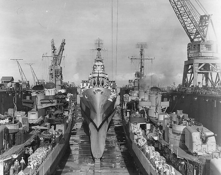 Destroyer Claxton, heavy cruiser Canberra, and destroyer Killen being repaired in floating drydock USS ABSD-2, Manus, Admiralty Islands, 2 Dec 1944