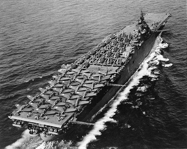 24 SBD, 11 F6F, and 18 TBF/TBM aircraft parked on the flight deck of carrier Essex, May 1943