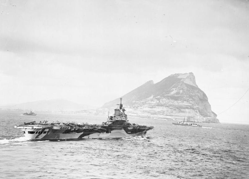 HMS Formidable and two destroyers off the Rock of Gibraltar, 1940s; photo taken from HMS Rodney