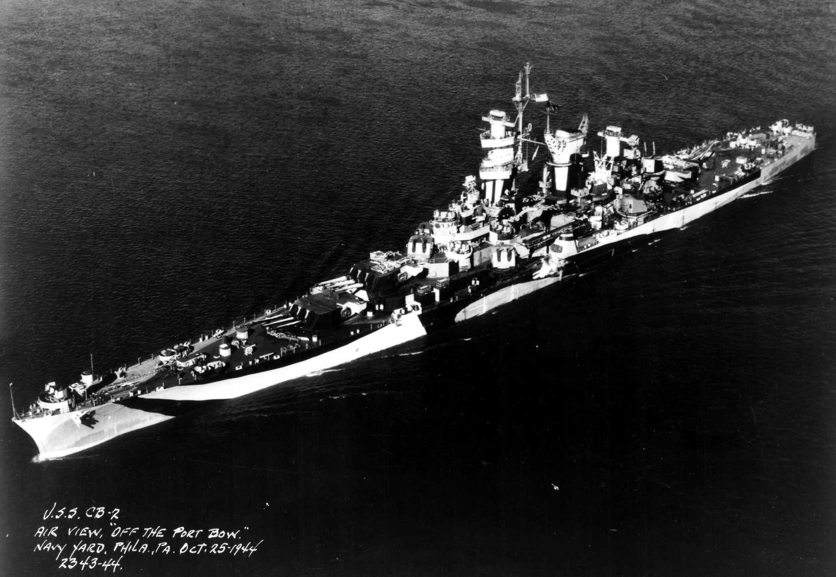 Aerial view of large cruiser Guam, Philadelphia Navy Yard, Pennsylvania, United States, 25 Oct 1944, photo 2 of 5