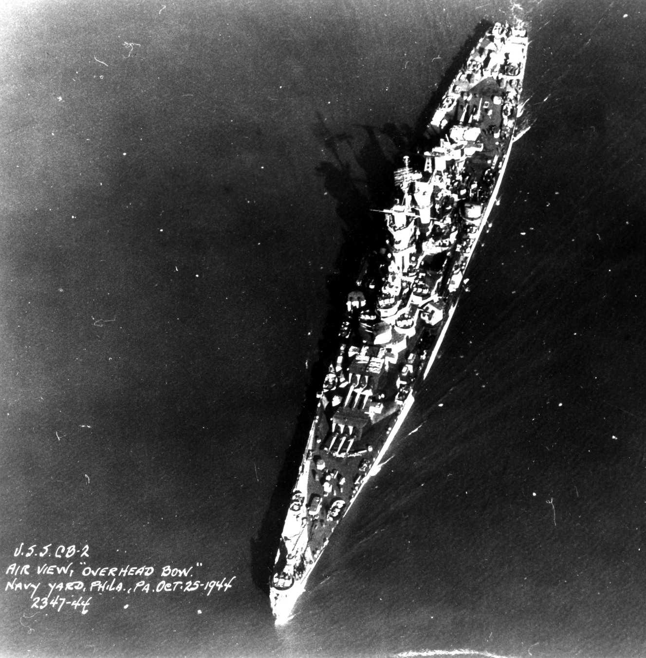 Aerial view of large cruiser Guam, Philadelphia Navy Yard, Pennsylvania, United States, 25 Oct 1944, photo 4 of 5