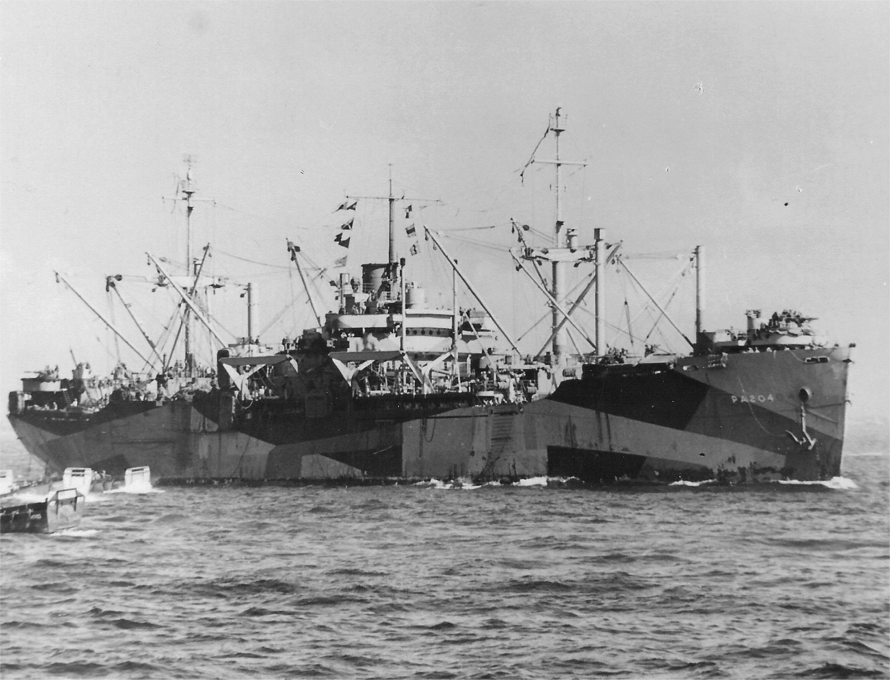 Haskell-class attack transport USS Sarasota in operation during the landings at Lingayen Gulf, Luzon, Philippine Islands, 8 Jan 1945
