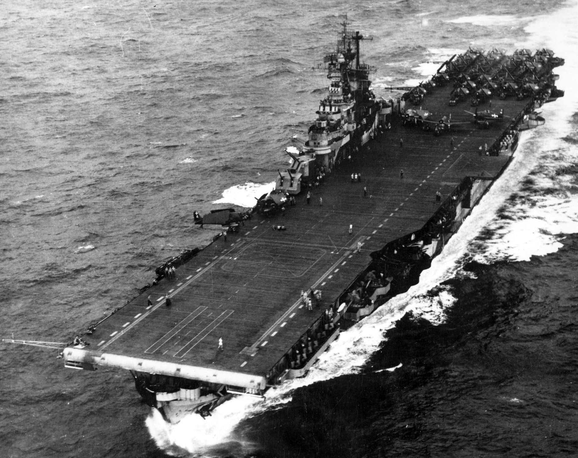 Intrepid in the Philippine Sea, Nov 1944, with F6F Hellcat fighters on her flight deck