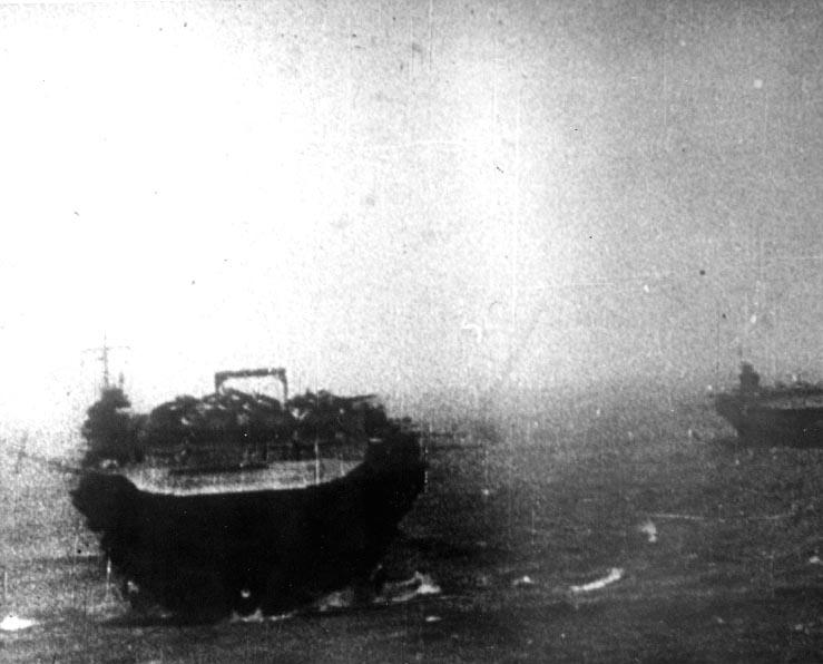 Kaga in heavy seas en route to Pearl Harbor, circa early Dec 1941; carrier Zuikaku in background