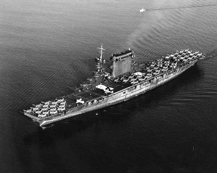 Lexington leaving San Diego, California, 14 Oct 1941, with F2A-1 fighters parked forward, SBD scout-bombers amidships, and TBD-1 torpedo bombers aft
