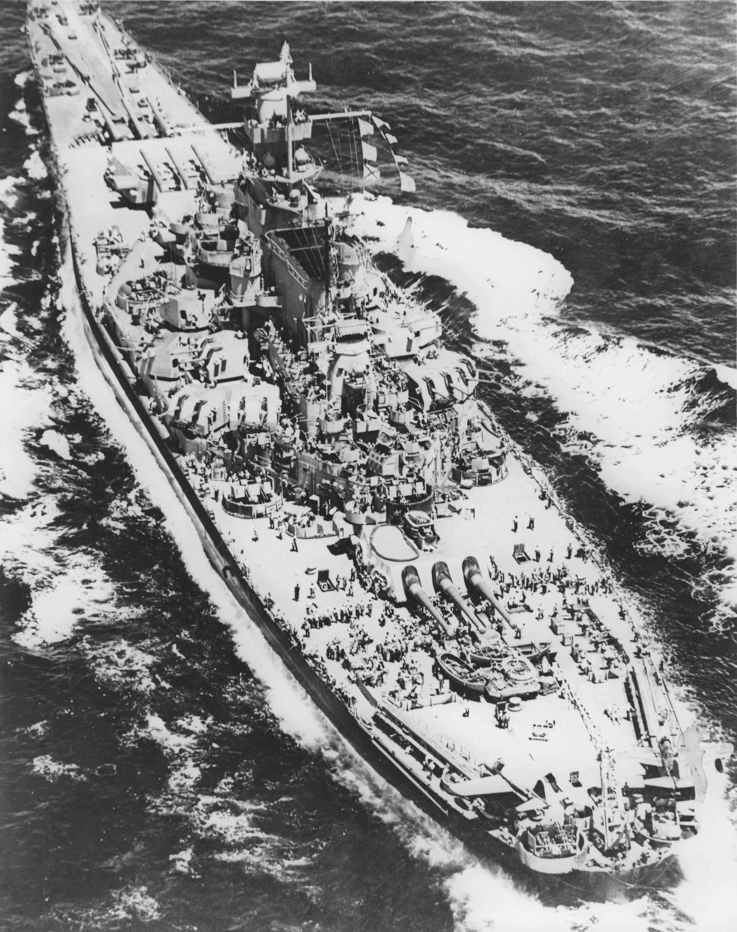 Aerial view of US battleship Massachusetts, 1943; note OS2U Kingfisher float planes on the fantail catapults