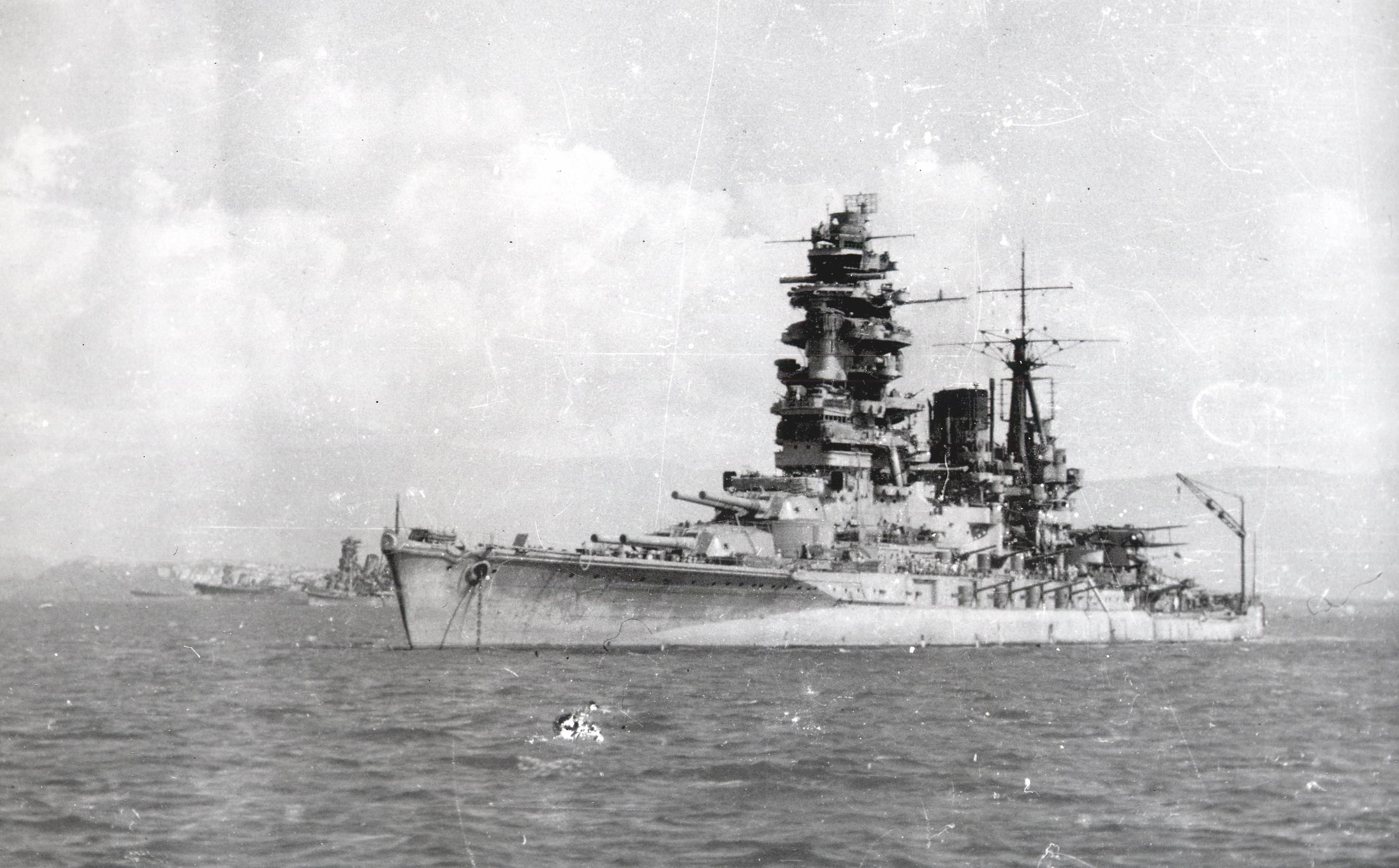 Musashi, Yamato, a cruiser, and Nagato at Brunei, Borneo, Oct 1944