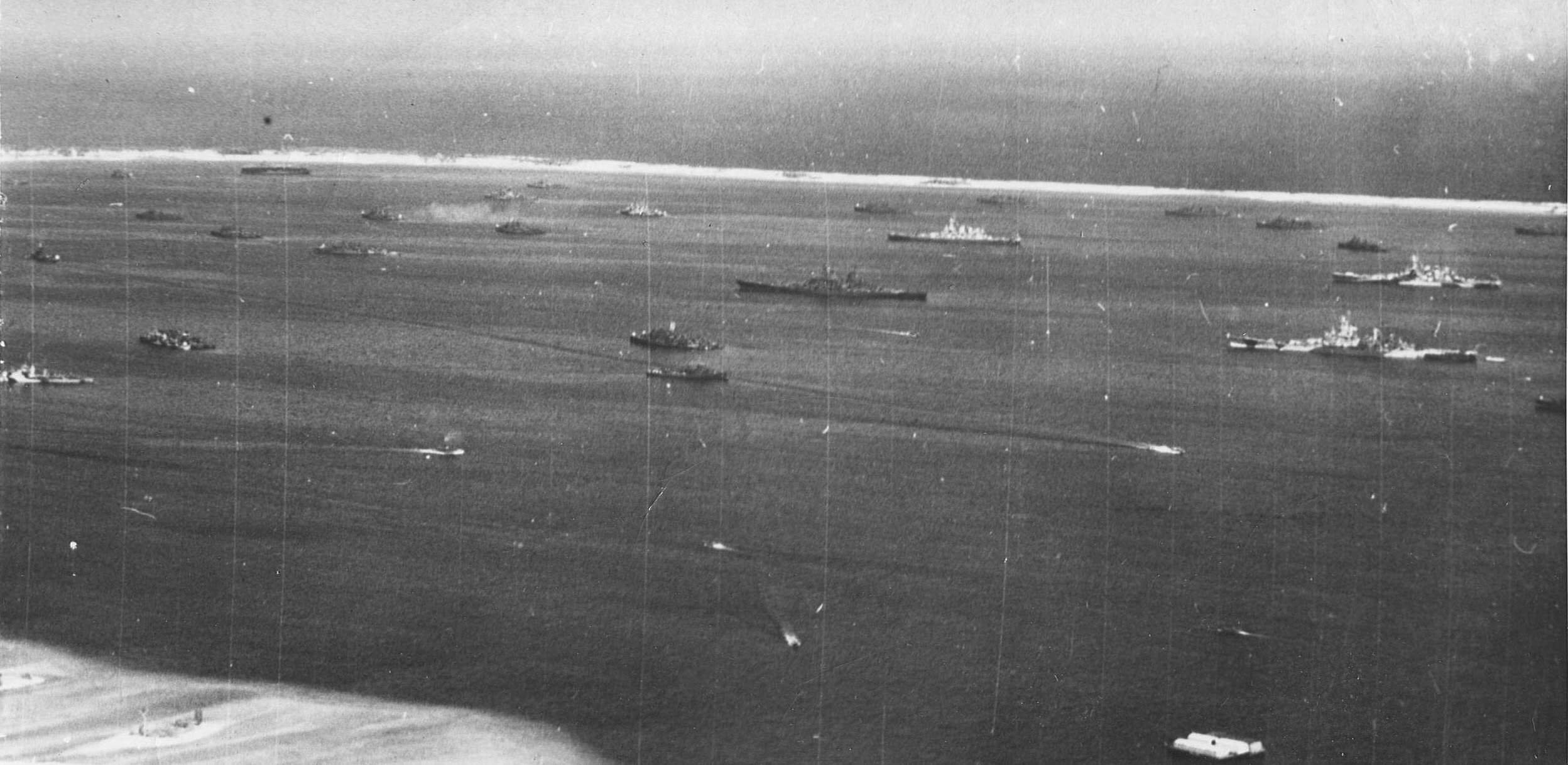 Four US battleships of Task Group 58.7 in the fleet anchorage at Majuro Atoll in the Marshall Islands, 8 Jul 1944