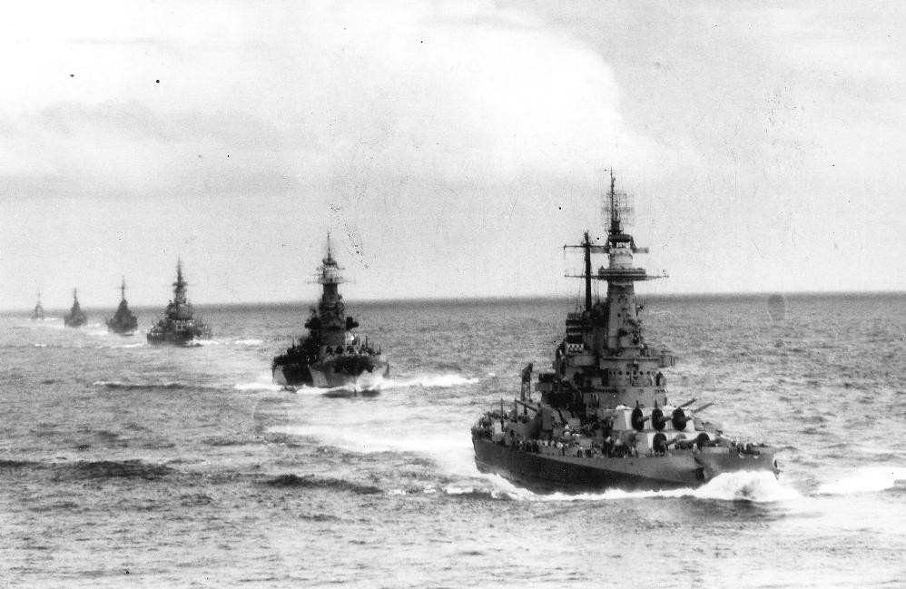 US Navy Task Group 38.3 entering Ulithi anchorage in a column following strikes in Philippine Islands, 24 Dec 1944, photo 7 of 7